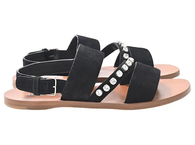 Sandali flat con cinturino posteriore in suede nero decorati con cristalli Miu Miu