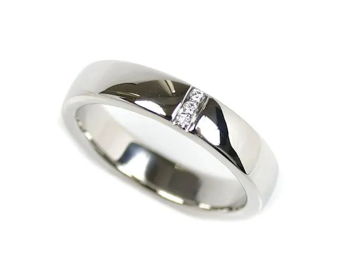 Anello in platino con tre diamanti Harry Winston