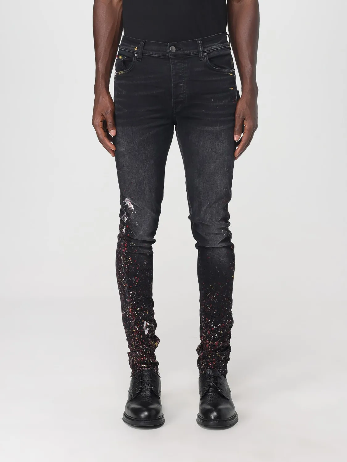 Jeans skinny Amiri con schizzi di pittura