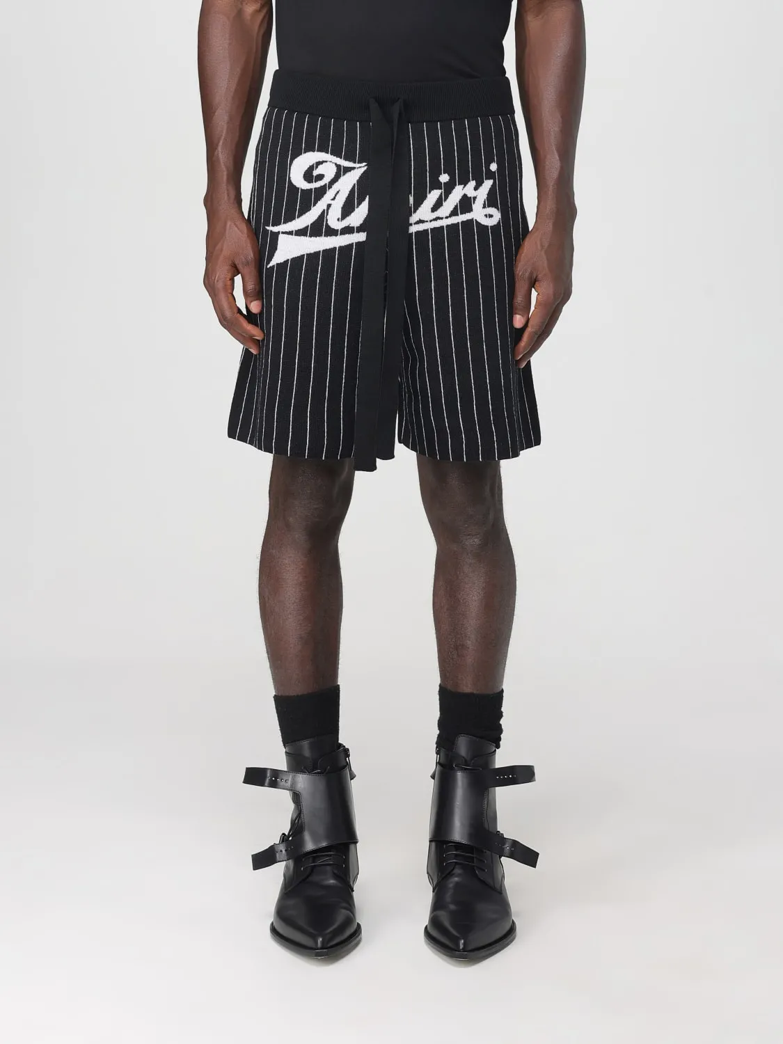 Pantaloncino di lana aa righe con maxi logo Amiri