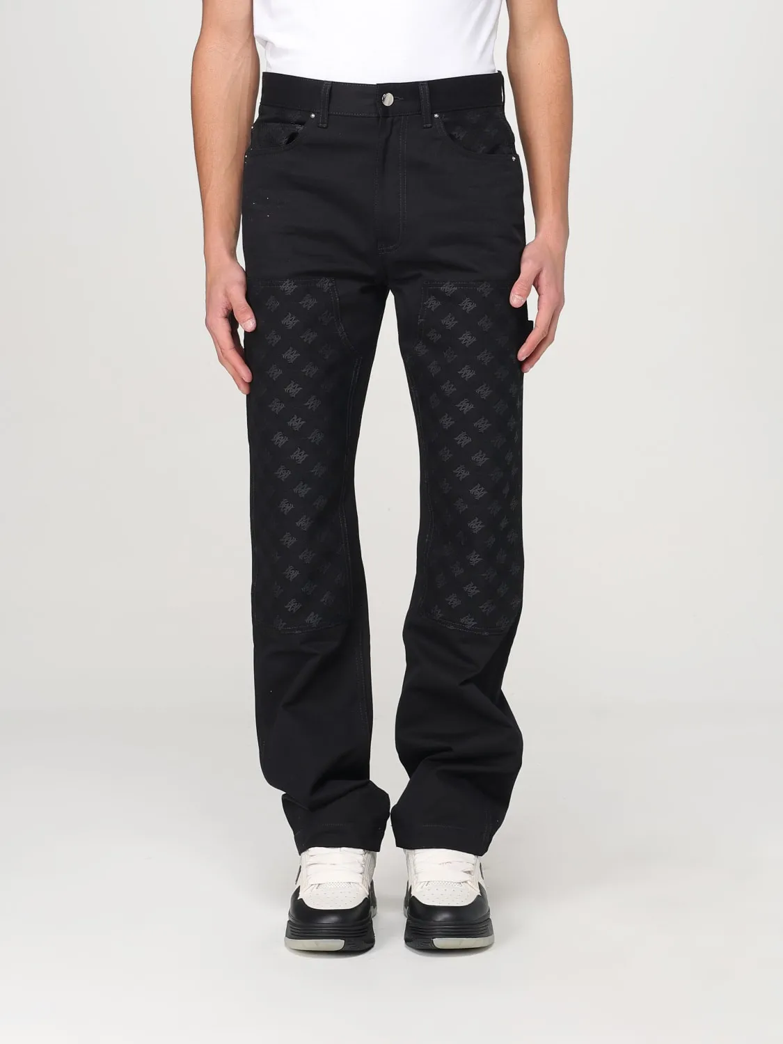 Jeans Amiri in denim con motivo monogram