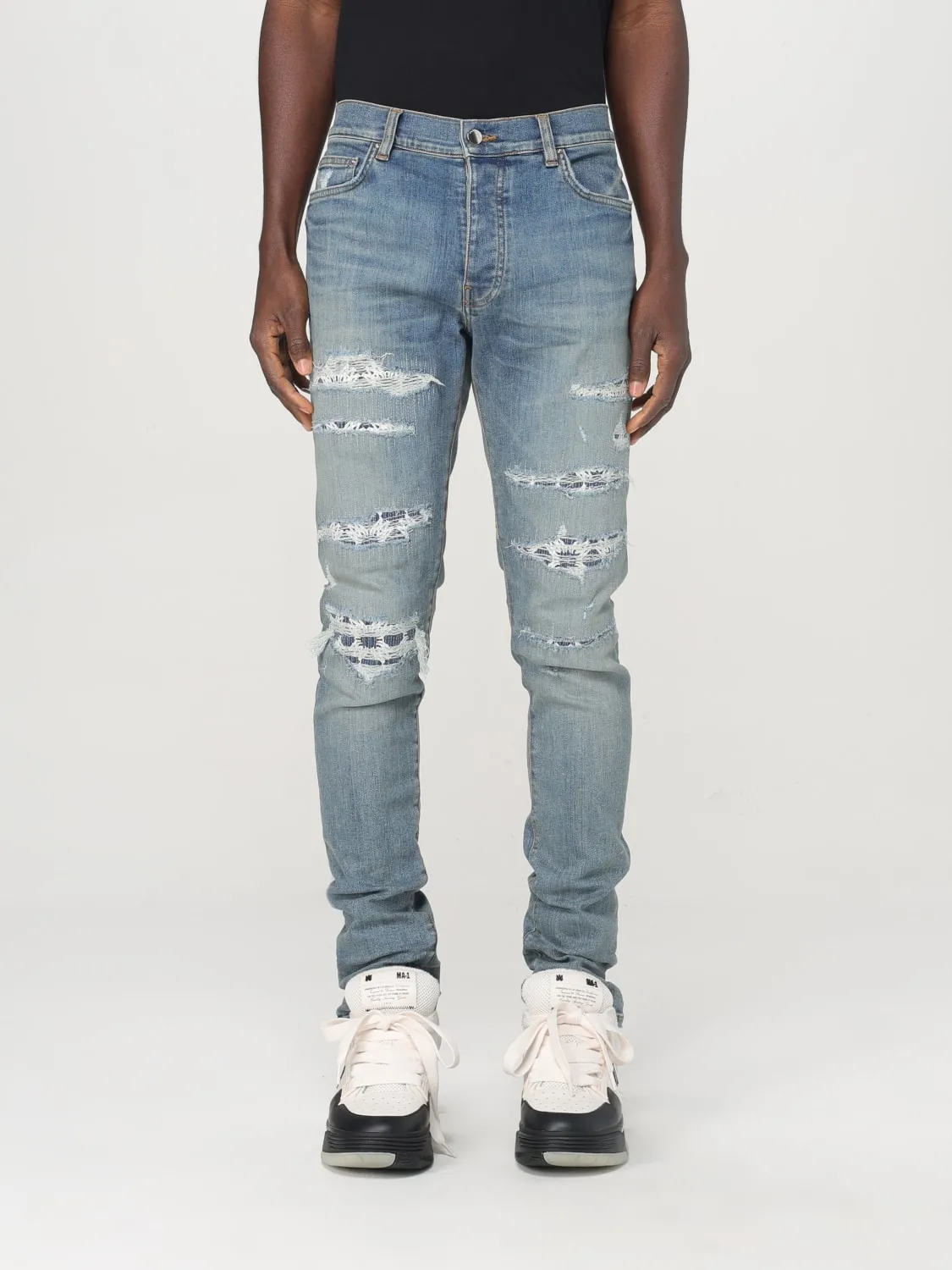 Jeans Amiri in denim distressed