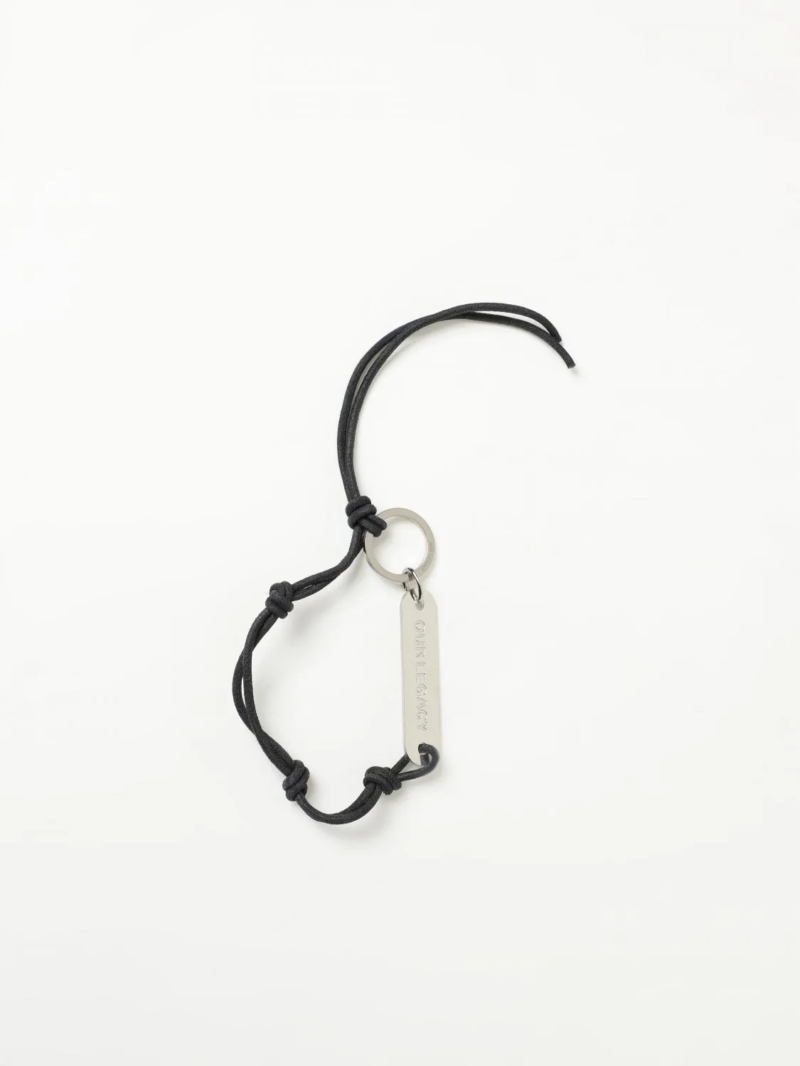 Portachiavi Our Legacy in pelle con targhetta