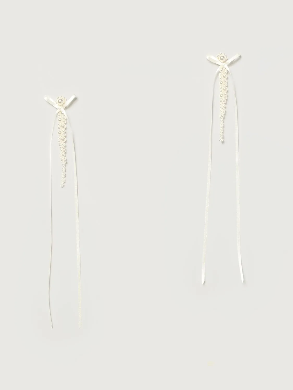 Orecchini Simone Rocha in tessuto con perle